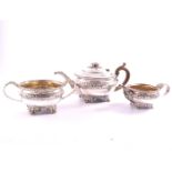 A George IV silver three piece tea set, by Edward Farrell, London 1823, comprising teapot,
