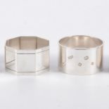 Three octagonal silver napkin rings, by Mappin & Webb, London 1985; a pair of circular napkin rings,