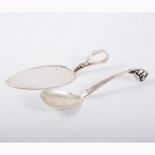 Danish Arts & Crafts style cake slice, in the style of Georg Jensen,