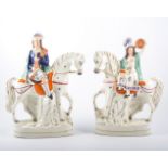 Two Staffordshire figures, man with bagpipes on a horse, and a lady with a tambourine on a horse,