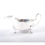 Silver sauce boat, Birmingham 1966, cut outlines, raised on three pad feet, 5ozs, .5cm.