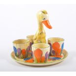 Clarice Cliff novelty egg cup stand 'Crocus' pattern, modelled as a duck with four egg cups,