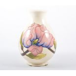 Moorcroft Pottery 'Magnolia' vase, on cream ground, 1990, 19cm.