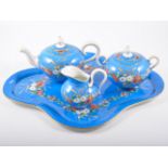 A blue cabaret tea set, small tea bowls, pair of Coalport pink vases,