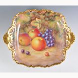 A Royal Worcester square twin handled dish, shaped rim with twin shell handles, painted number 695R,