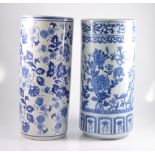 Two Chinese blue and white stick stands/floor vases, 44cm high.