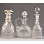 Five decanters and two jugs,