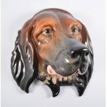 Beswick ceramic dog head, with three other dog figures, (4).