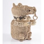 18th Century Nottingham stoneware bear jug and cover, clasping cub to his chest,