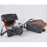 Assorted camera equipment, including a Praktica MTL5.