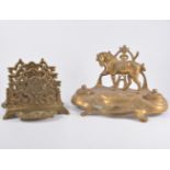 Edwardian brass desk stand, two wells, 28cm; together with a cast brass letter rack.