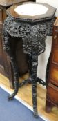 A Chinese marble topped hardwood urn stand, H.91cm