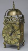 A brass lantern clock