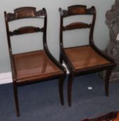 A set of six Regency brass inset simulated rosewood dining chairs