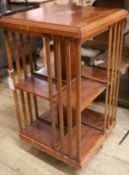 An inlaid mahogany revolving bookcase, W.46cm