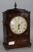 A Regency mahogany brass inlaid eight day bracket timepiece