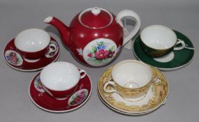 A Russian Gardner part tea set, inc. teapot and two Kornilov Bros cup and saucer sets and a small