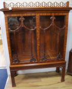 A Chippendale style carved mahogany glazed display cabinet, W.107cm H.146cm