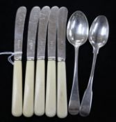 Five George V silver tea knives and two silver teaspoons.