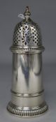 A 1930's George I style silver 'lighthouse' caster, Birmingham, 1937, 6.25in, 6 oz.