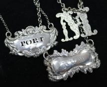 Two Georgian silver wine labels 'Rum' and 'Port' and a Victorian letter 'M' wine label.