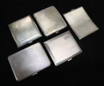 Five silver engine-turned cigarette cases, some inscribed
