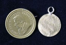 A South African gold half-pound coin, mounted as a brooch and a Napoleon III gold coin pendant (a.