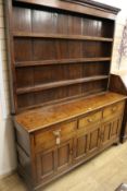 A George III oak dresser, W.162cm H.207cm