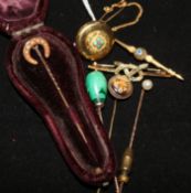 Four late Victorian stick pins, a gold and turquoise locket stud and two bar brooches.