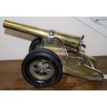 A brass model of a Winchester cannon by the Bellmore Johnson Tool Co. Ltd, Connecticut, USA, 38cm