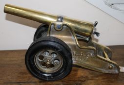 A brass model of a Winchester cannon by the Bellmore Johnson Tool Co. Ltd, Connecticut, USA, 38cm