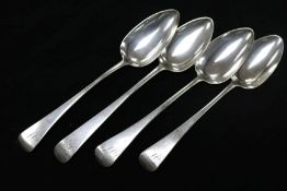 Four early 19th century Old English pattern silver table spoons.