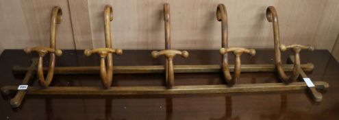 A Thonet wall hanging coat rack, W.121cm