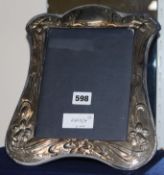 A 1980's Art Nouveau style silver mounted photograph frame, 12in.