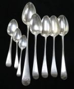 Four Georgian silver tablespoons, a basting spoon, a dessert spoon and two teaspoons.