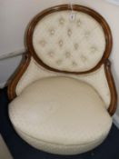 A Victorian beech buttonback nursing chair