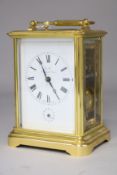 A gilt brass carriage clock with alarm