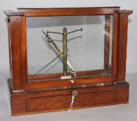 A set of mahogany cased chemist's scales