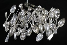 A pair of silver sugar tongs and a quantity of silver tea and coffee spoons, including sets