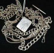 Four silver alberts and an early 20th century silver stamp case with chain.