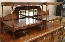 A pair of mahogany two tier occasional tables, W.61cm