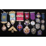 A collection of silver Masonic and other breast jewels, badges and watch fobs and an R.A.O.B. pin