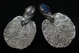 Two similar silver rabbit and cabbage leaf pin trays, one modified as a pin cushion and with maker's