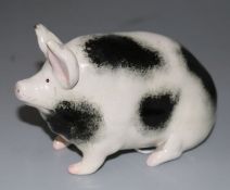 A Wemyss black and white ceramic pig, A/FImport Tax of 5% is payable on the hammer price on this lot
