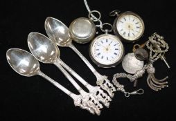 A set of four silver coffee spoons, two silver fob watches and a sovereign case