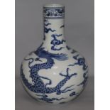 A blue and white dragon vase