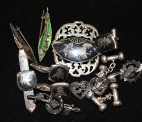 Two early 20th century brooches and other items including silver and niello.