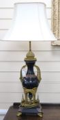 A pair of 19th century ormolu and marble table lamps, of architectural form (converted to