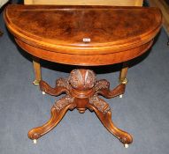 A Victorian walnut demi-lune card table, W.92cm