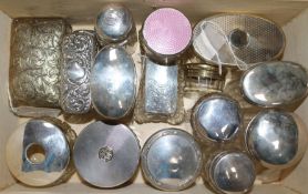 A Victorian embossed silver-mounted cut glass box (a.f) and 15 other silver mounted toilet jars